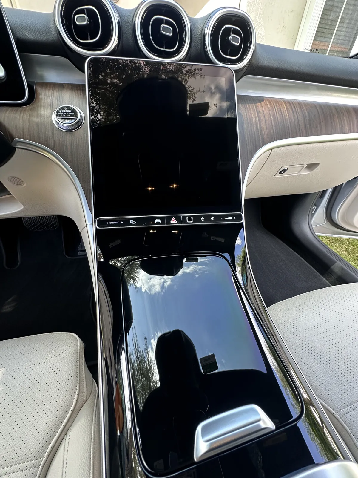 Mercedes-Benz interior with the center console and leather armrest in view